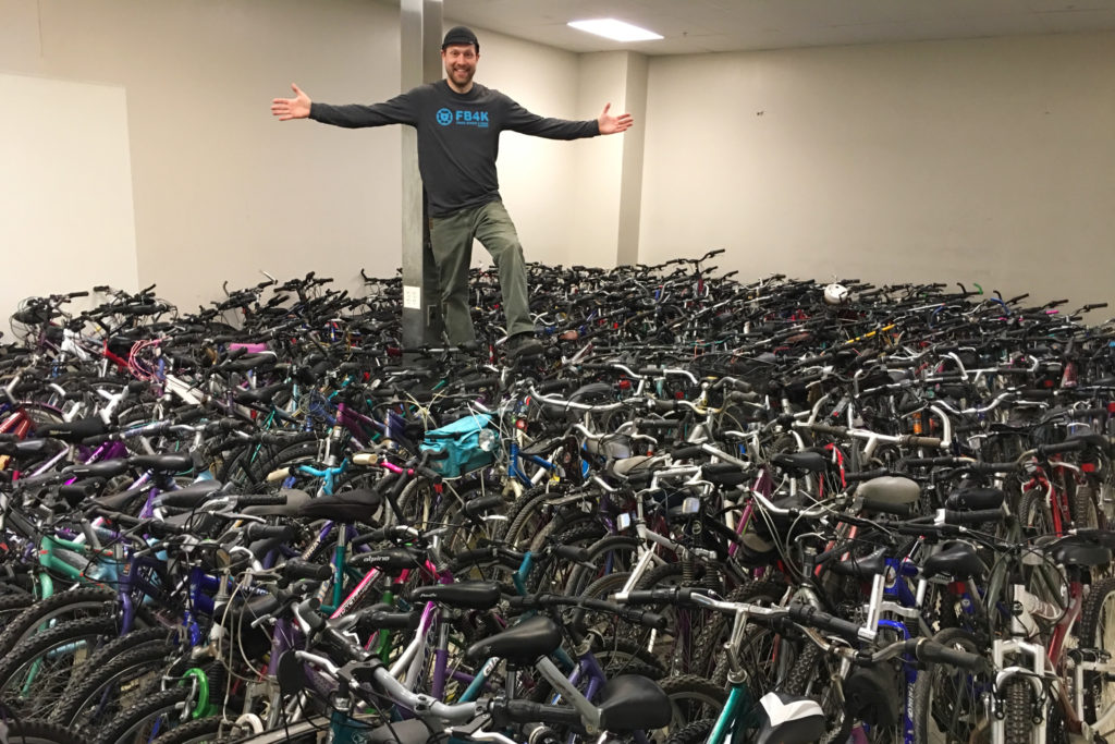 Andy Quandt with bikes donated to Free Bikes 4 Kidz Madison.