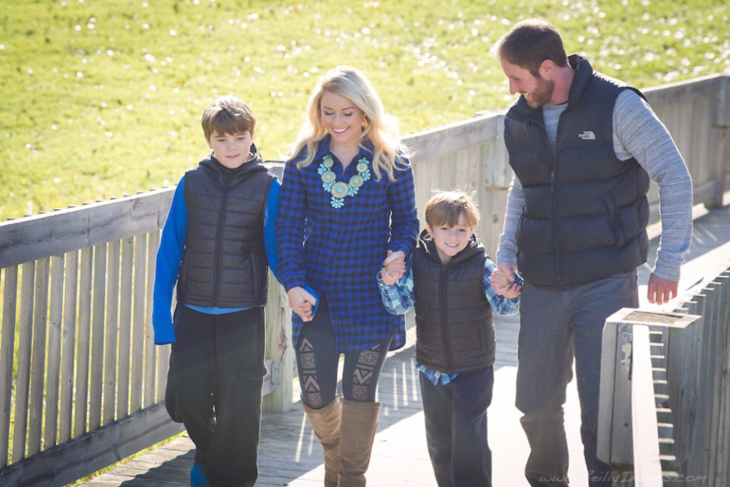 Enna Doyle walking with her family.