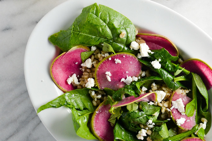 Spinach and watermelon radish salad by Vicky Volvovski.