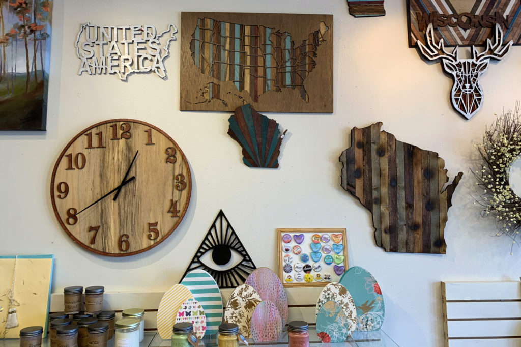 Signs and gift items on display at JNJ Craftworks in Verona, Wisconsin.
