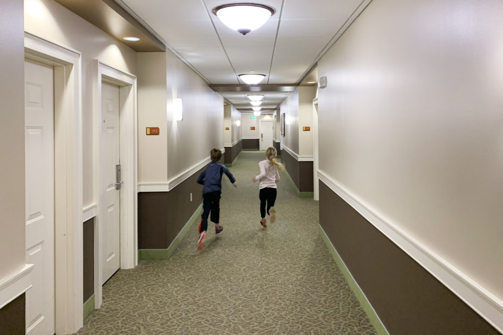 Kids running through the halls of the Jefferson Street Inn in Wausau, Wisconsin.