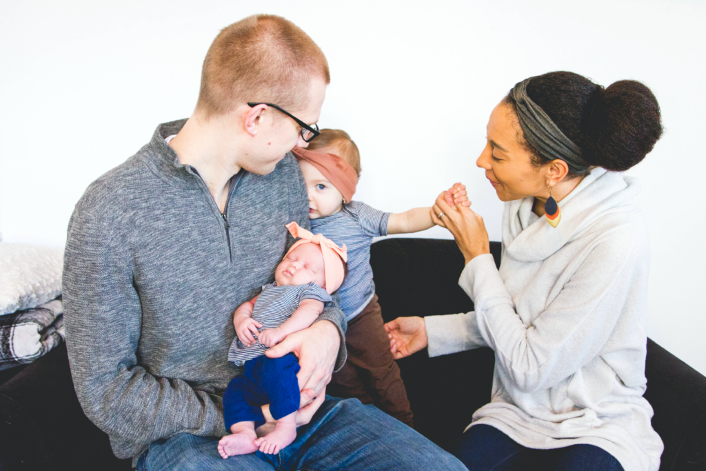 Courtney and Drew McLean with their baby girls.