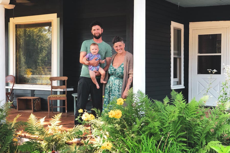 Isaiah Miller, Rubina Martini and their child Wild at Tomorrow River Homestead in Central Wisconsin.