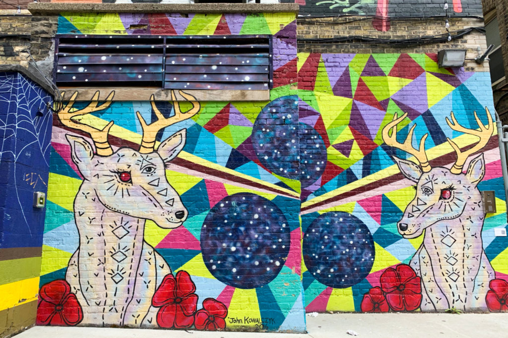 A mural of deer in Black Cat Alley in Milwaukee, Wisconsin.