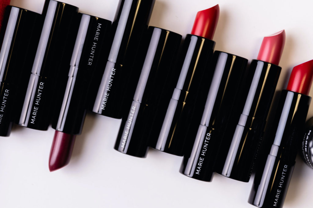 A row of lipsticks by Marie Hunter Beauty.